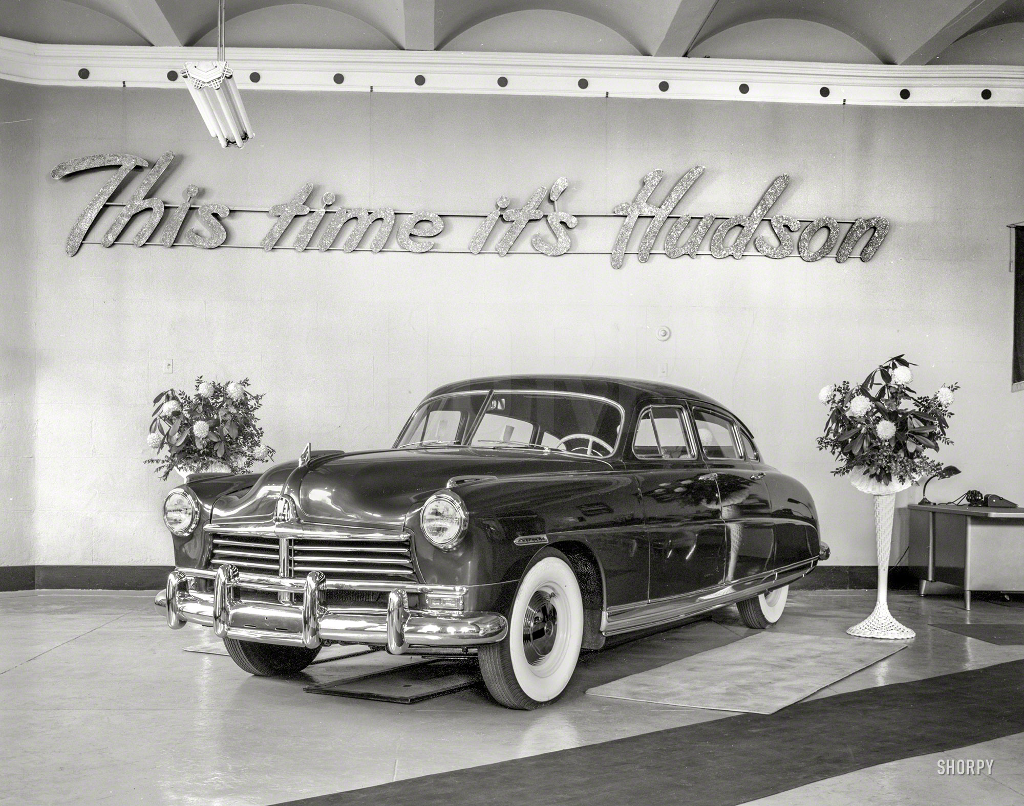 New York circa 1948. "The new Hudson." From a design standpoint, the venerable carmaker's last hurrah. 4x5 acetate negative by John M. Fox. View full size.