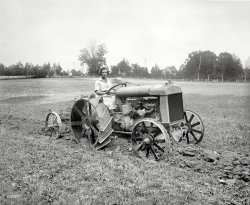 Sept. 26, 1921. "Ford tractor demonstration." Another look at the plowing bee held on the Washington, D.C., estate of former Maryland senator Blair Lee. A photo in the Washington Star identifies this young lady as "Miss Myrtle Lewton of Takoma, Md., Golden Eagle Girl Scout who received her decoration from the Queen of Belgium." National Photo Company glass negative. View full size.