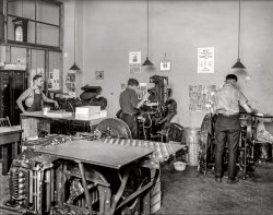 January 1922. Washington, D.C. "Machinists' Association -- printers." Activities relating to the International Association of Machinists. National Photo Co. glass negative. View full size.
Before WordPerfect or even Atari Writer ...I am reminded that my junior high school industrial-arts class (boys only, in those dark ages) included a month of weekly sessions on manual typesetting (in addition to wiring, woodworking, and metalworking). It started off with a hand-held composing stick onto which you placed letters from the wooden type case, upside down and backwards. You advanced to setting a whole page in a metal frame, inserting lead spacers between paragraphs and locking the whole thing solid with key-tightened springs around the border. The irascible instructor, Mr. L______, who seemed vaguely disgruntled with life, would walk around, tilting the frames upright and rapping your typeset assemblage in the middle. If the type collapsed into chaos on the bench, he'd smirk and say "Better sort it out and try again, tighter," then walk off. Oddly, despite the abundance of sharp or heavy tools in the area, he was never murdered. The uplifting part of the experience was that none of us had ever heard of a single alumnus who had ever made a living as a typesetter, or wished to. But I do not begrudge the experience: it taught me to respect the craftwork mastered by folks like the guys in the photo.    
A Century AgoI'm no where near 100 years old, but my mind still has difficulty processing the fact that 1922 was already 100 years ago.
Grand Lodge, International Association of MachinistsJust in case anyone was curious about the building on the calendar. Built in 1919, it sat across from the AFL-CIO building at 9th Street and Mount Vernon Place NW in DC.
The new female supervisor ...has just advised the chap on the left that his choices for wall display in front of his press are inappropriate, and need to be removed.
Moving on upLooks like one of them has traded in his cards and bubble gum for something more adventurous.
Manual LaborI operated presses like that in high school, even had one in my garage for years. The pressmen are interesting, two have baseball pictures on the wall and the other guy has girls. I see a spittoon on the floor. 
Sports section, women&#039;s sectionSports on the right, women's on the left, judging from the "halftones" on the wall in each location.
Model ModelsMightn't the images on the wall (models; baseball players) be samples of what the artisans are printing at their respective presses?
Upside upside down, but not backwardis actually the way to set type, and also from bottom to top, rather than top to bottom. It still works, and there are a few hundred of us who still on occasion set type by hand.
Pay AttentionLotsa ways to lose a finger or limb in this picture.
Horological Accuracy -Provided by the Naval Observatory, via Western Union.
Stop the Presses!I also ran a letter press such as these in Industrial Arts class.  The one we had was probably older than these.  I also worked as printer for a few years in a check printing plant which used letter presses well into the 1980's.  I ran Intertype Machines which were automatic type setters that cast the lead slugs used in the big presses.  I'm sure I am one of the last people to ever have been trained on such machines, they were phased out about 2 years afterward.
I was trying to figure out what the tall structure on the center press was.  The operator is hand-feeding the paper into the press.  His right hand is on the unprinted stock. The press on the left has an auto-feeder (meaning the press is "sheet-fed").  You can see the vacuum lines which provide suction to lift the sheets of paper and draw them into the press.  It dawned on me that the two presses, left and center, are identical.  The center press is also sheet-fed, but the mechanism has been swung up, out of the way (the vertical structure) and is being hand-fed.
Hand feeding a letter press means you have to remove the freshly printed sheet with your left hand and put in a fresh sheet with your right hand as the press cycles open, and do so before it closes again.  Meaning, BOTH of your hands are inside a running machine each cycle.  Thats why the guys in the photo are concentrating so hard on what they're doing.
The machine in the fore-ground: my guess is that it's a folding machine. 
Platen pressesAs a former employee of a Dutch Company, Bührmann-Tetterode, that used to be an important player in Europe on the market for Platen Presses, I am delighted with pictures like this, showing print shops, like you may see them nowadays still frequently in Asian countries like Indonesia (the country where my wife was born when it was called Dutch East Indies). My firm represented  the, rather famous, Heidelberger Druckmaschinen Gesellschaft in Europe, except for Germany and the U.K. The Original Heidelberg Platen Press was often referred to as the Heidelberg Windmill, which is a rather curious name for me as a Dutchman. The platen presses we see here may well be Chandler &amp; Price platen presses.
Dang Near Cut My Finger Off!Years ago my father owned a boutique printing company and an advertising agency. One of the printing presses was a letterpress, with moveable type. I remember watching him set type.
My brothers and I had the job of busting up the type and putting it back in the type drawers which were called 'cases'. The trade term for the kids who busted up the type was "printer's devil". Each font went into a different case and each letter went to a specific bin in the case. Woe to the devil who put a sort (pieces of type) in the wrong space! Now you know where the term 'out of sorts' originated!
I can still remember the layout of the cases and where each sort belonged. The type was made out of lead.
I remember how amazed I was the first time I saw a linotype machine.
This press was at a junk store. The press and all the type for $850.  Years ago.
One day I was talking to my dad while he was running the press. I stumbled and laid my hand on the press for balance. The press was running and I about cut my index finger off. The finger, my right index finger, is crooked and shorter than my other fingers. I don't have much feeling in it and I don't use the finger much. I was maybe eleven or twelve years old.
(Technology, The Gallery, D.C., Industry & Public Works, Natl Photo)