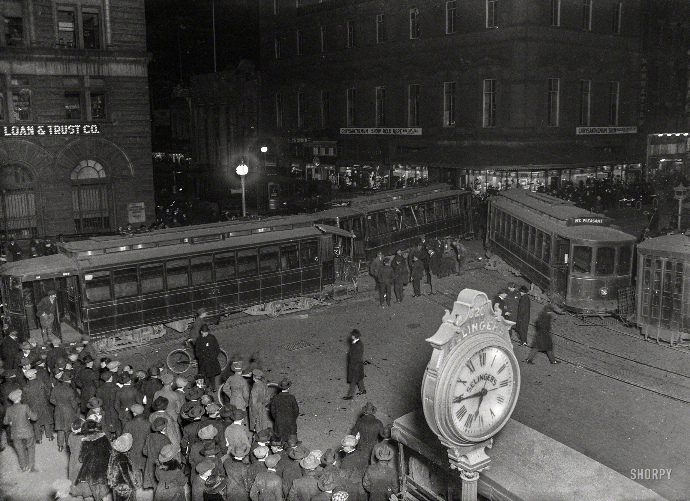 November 12, 1920. Washington, D.C. "14 PERSONS INJURED IN CRASH OF 3 CARS: Wreck at 9th and F Streets When Brakes Fail to Work Endangers Many Others. POLICEMEN LEAP TO SAFETY. More Than 2,000 Citizens Delayed an Hour in Getting Home ... " Harris & Ewing glass negative. View full size.