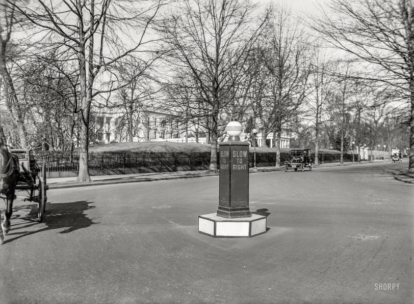 Washington, D.C., circa 1922. "NO CAPTION (Street near White House)." Another of the Harris &amp; Ewing "traffic" photos, this one showing what looks like a wayward gas pump. 5x7 inch glass negative. View full size.
