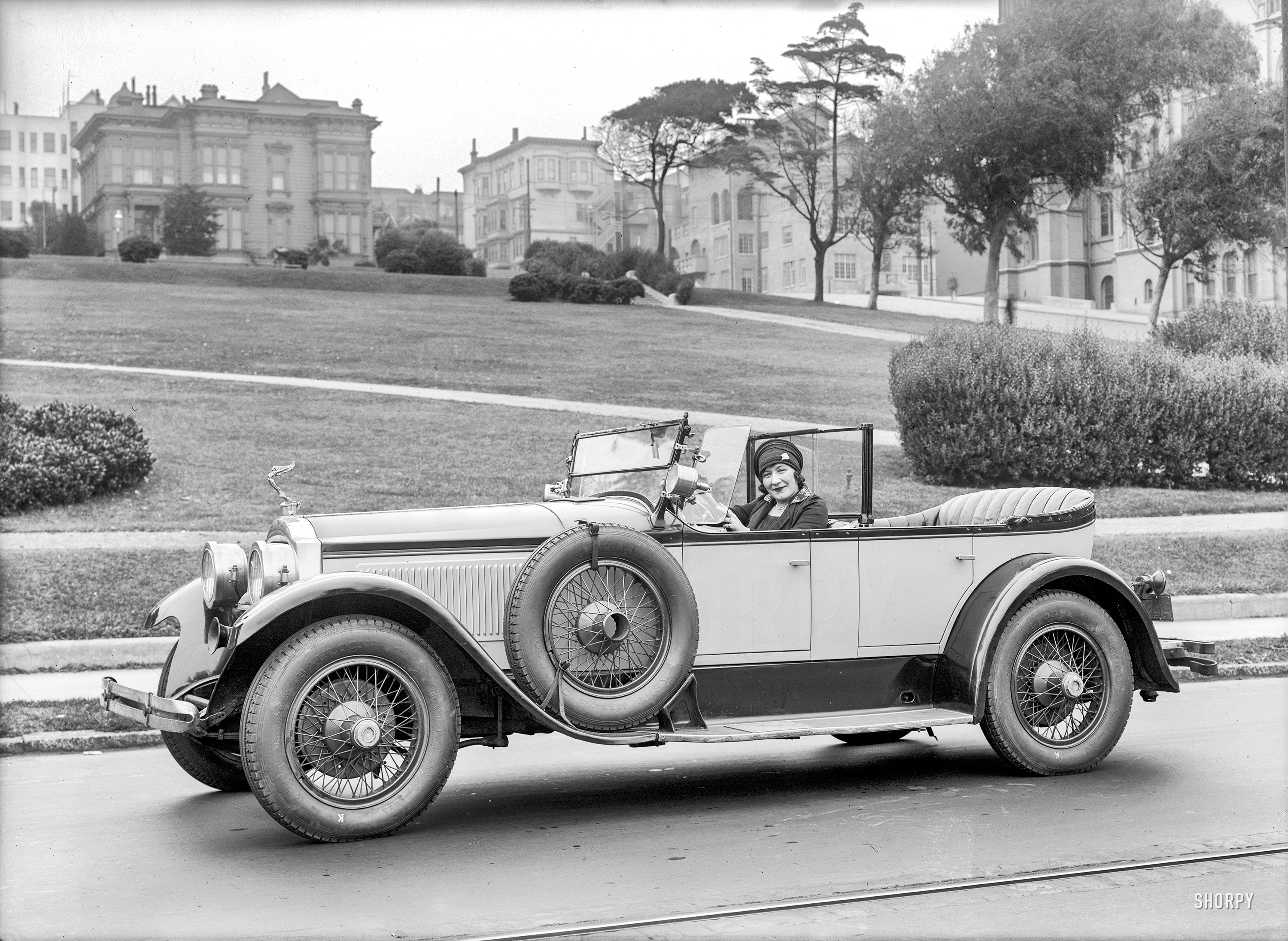 From somewhere in San Francisco comes this undated, unlabeled photo of a lady in a fancy-looking phaeton with a glass headrest. Who can tell us what she's driving, and when? 5x7 glass negative by Christopher Helin. View full size.