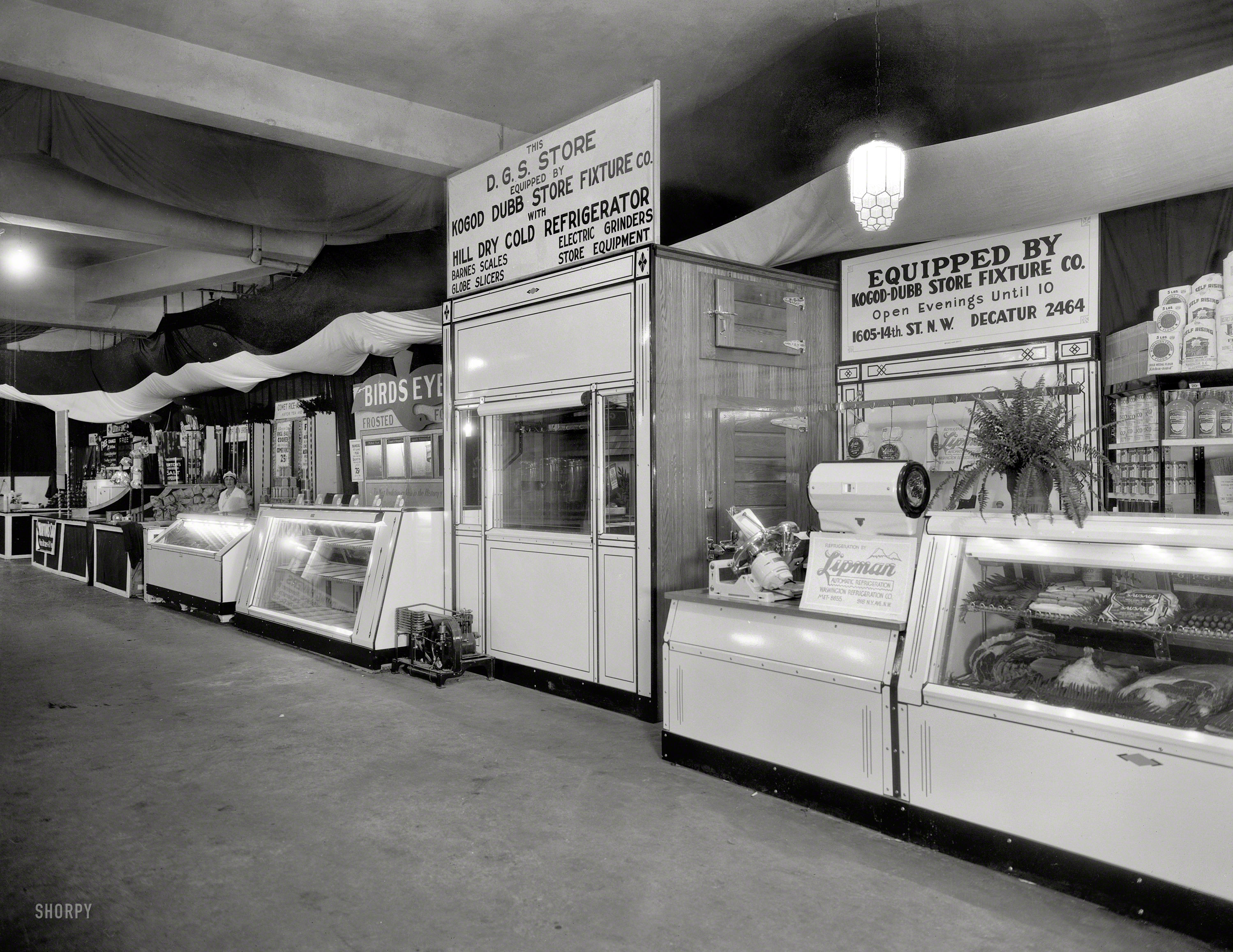Washington, D.C., circa 1935. "D.G.S. Store and other vendors at trade exhibi&shy;tion." 8x10 inch acetate negative, National Photo Company. View full size.