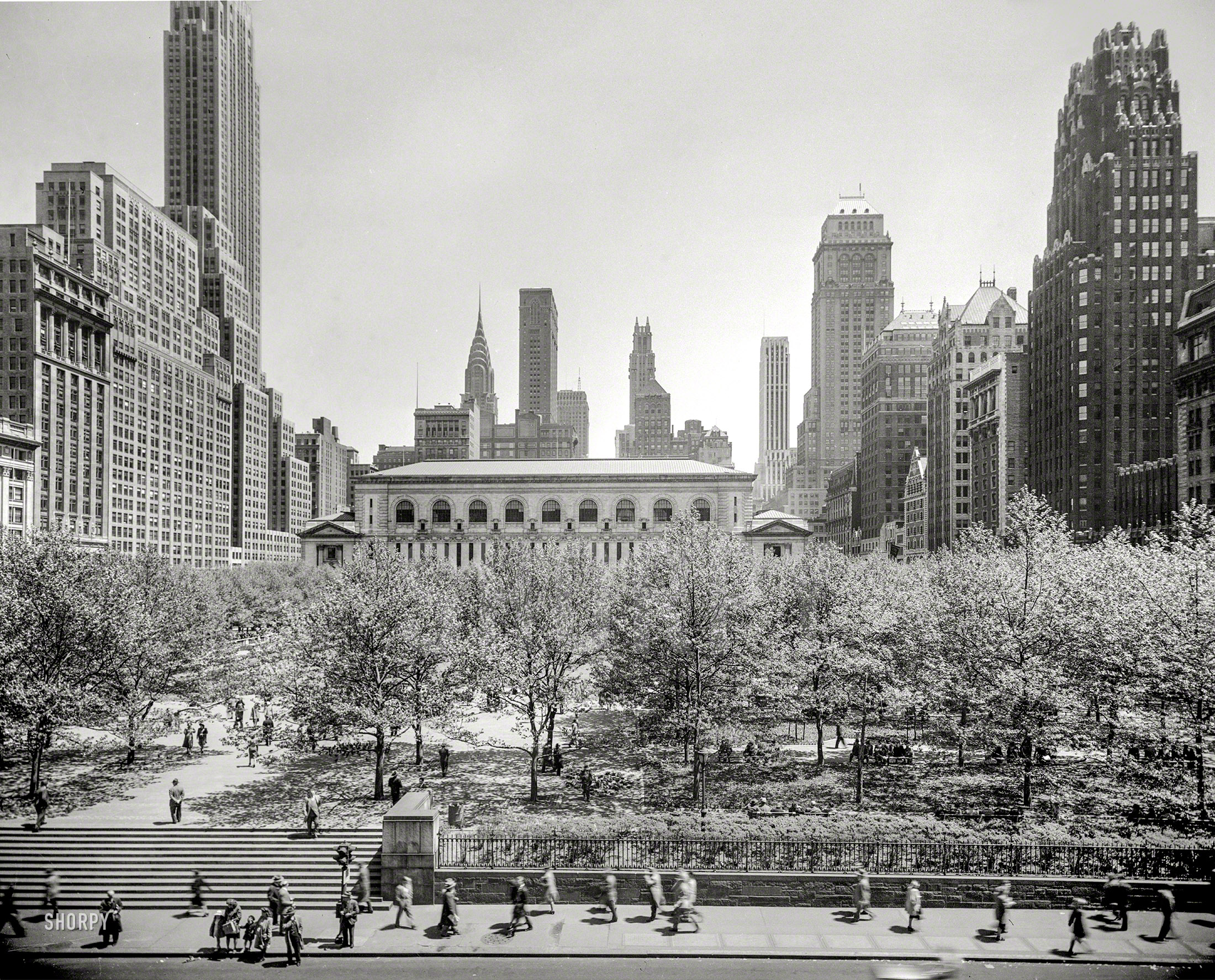 New York City circa 1948. "Bryant Park and New York Public Library from Sixth Avenue." With views of the Chrysler Building and other Manhattan landmarks waiting to be named. 4x5 inch acetate negative by John M. Fox. View full size.