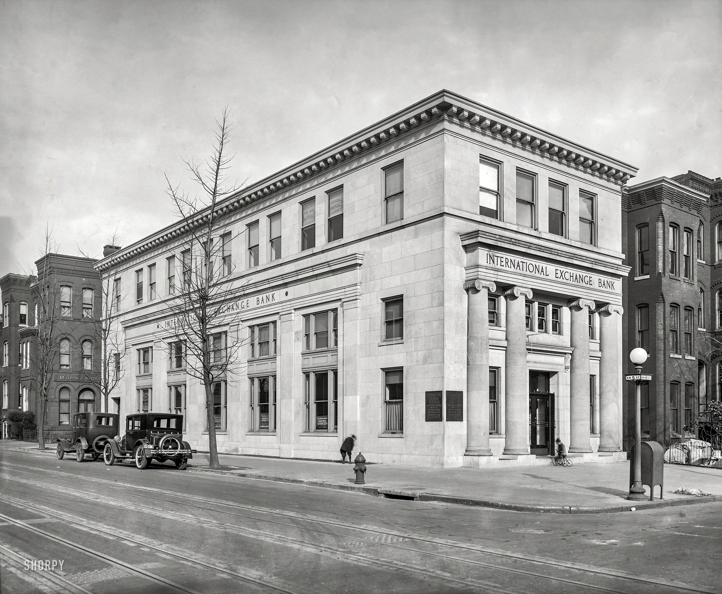 Washington, D.C., circa 1925. "International Exchange Bank, Fifth and H Streets N.W." National Photo Company Collection glass negative. View full size.
