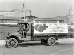 Fruit as First Aid to Convalescence
&nbsp; &nbsp; &nbsp; &nbsp; "Two Tons of Oranges -- the Gift of the Alhambra-San Gabriel Red Cross Chapter, to the Sick and Disabled Soldiers at Letterman Hospital, San Francisco. Your Turn Next!"

&nbsp; &nbsp; &nbsp; &nbsp; This legend in bold letters on the side of a two-ton auto truck advertised the merits of fruit as a first aid to convalescence over a circuit of five hundred miles, as the golden cargo made its way along the valley of the Southern California town on to the Pacific Coast. Newspapers all along the route gave a still wider publicity to the generosity of the Fruit Growers of the Sunset state for in addition to the oranges there were quantities of lemons and grapefruit, while at Los Angeles the local Red Cross Chapter added a contribution of seventy-five pounds of candy.
--Better Fruit, June 1920
March 1920. "Republic motor truck at Letterman Hospital, San Francisco, with cargo of oranges." 5x7 glass negative by Christopher Helin. View full size.