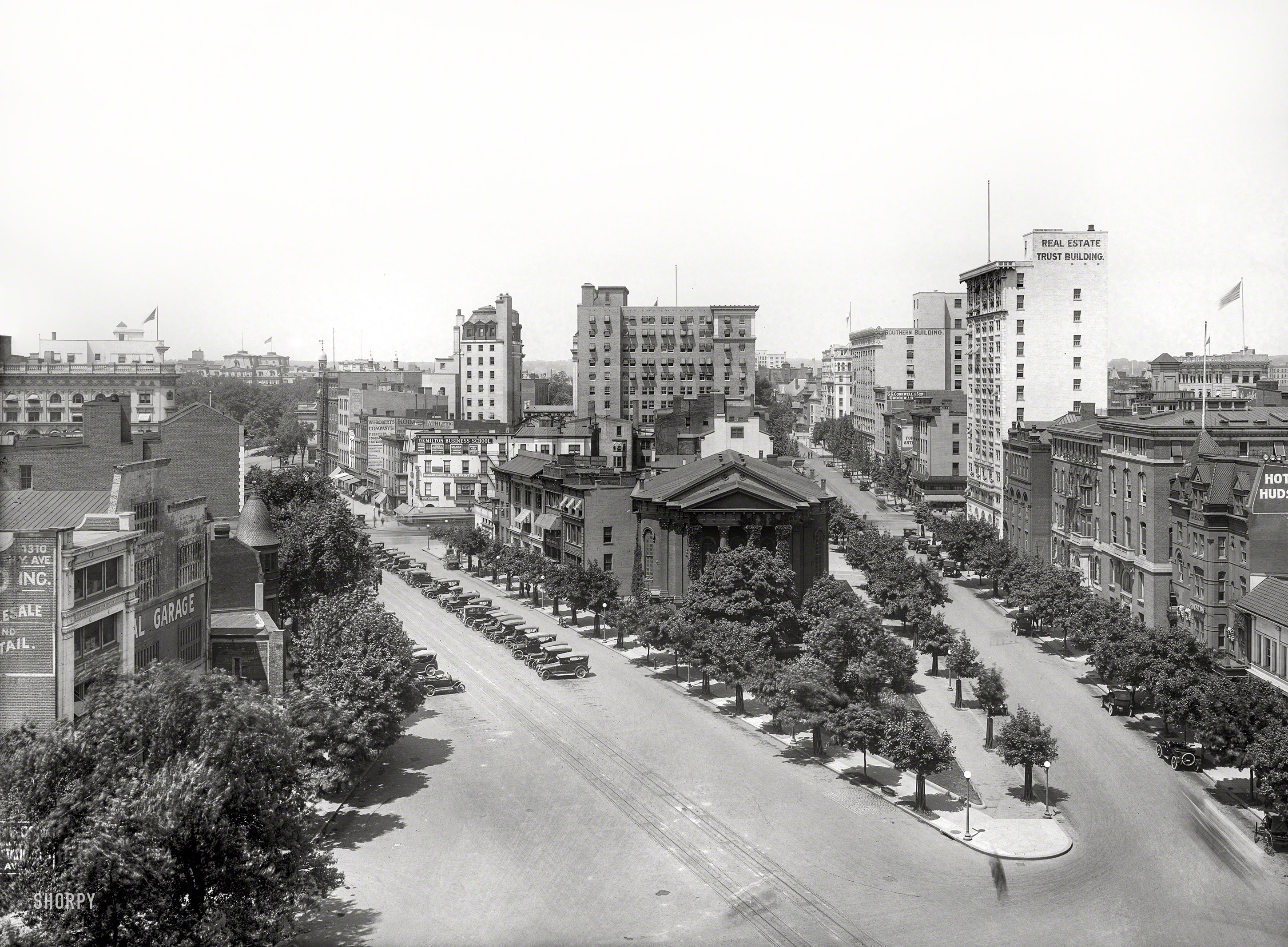 Washington, D.C., circa 1917. "Street scene, New York Avenue & H Street N.W., from Masonic Temple. New York Avenue Presbyterian Church with Woodward Building behind, and Southern and Real Estate Trust buildings." 8x10 inch glass negative, National Photo Company Collection. View full size.