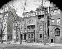 Washington, D.C., circa 1920. "Milton Apartments, H Street N.W." Where the amenities include a mounting block for stepping into one's carriage. National Photo Company Collection glass negative. View full size.
Oops. Someone goofed long ago.That's not the Melton. That's the Milton. The Melton was at 318 New York Ave NW, but the transom on the building on the right is 1727. No building with a 1727 number is anywhere near 318 New York.
But The Milton was at 1727 H Street NW.
Sources: 1909 Boyds Directory, 1903-1916 Sanborn Fire Insurance Map. 
Both the Milton (as shown), and the Melton (whatever it looked like) have been long demolished.
[Excellent detective work. - Dave]
Mute, inglorious MiltonsAlsatian is right. And the building visible at left is The Bachelor at 1737 H St. NW, which is still there today (albeit as an office building, not apartments). You can see one of its distinctive "B" crests at top left.
Get Me Rewrite!The site is now occupied by the Editors Building (now a Hampton Inn), completed in 1950, which was listed on the National Register of Historic Places in March 2015.
I work around the cornerThe Bachelor was looking dapper this morning.
+94Below is the same view from June of 2016.
(The Gallery, D.C., Natl Photo)