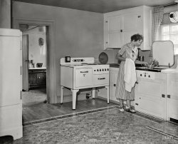 Washington, D.C., 1936. "Dept. of Interior exhibit -- kitchen at all electric farm." An early manifestation of the government's push for rural electrification, three years after the Tennessee Valley Authority was created by act of Congress. Harris & Ewing Collection glass negative. View full size.