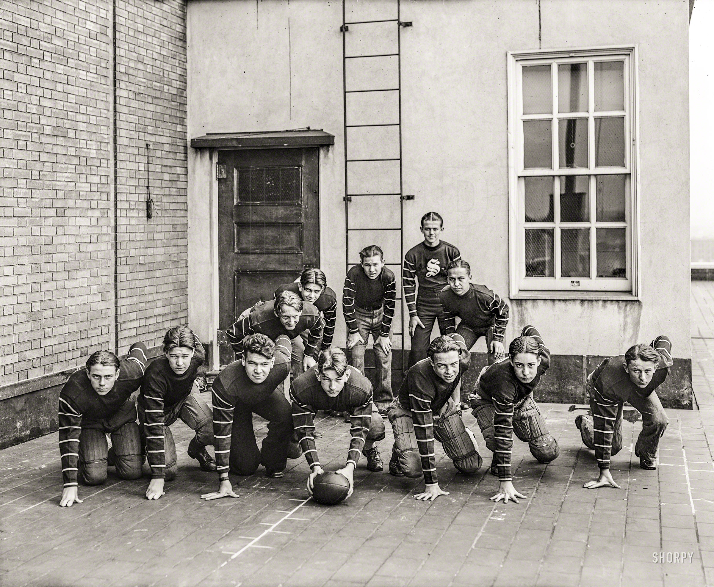 Washington, D.C., circa 1928. "Chesapeake & Potomac Telephone Co. office boys football team." National Photo Company glass negative. View full size.