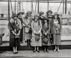 June 3, 1922. New York. "Schoolgirls sailing." Recent graduates, their chaperones and a litter of fleabitten furries. 5x7 glass negative, Bain News Service. View full size.