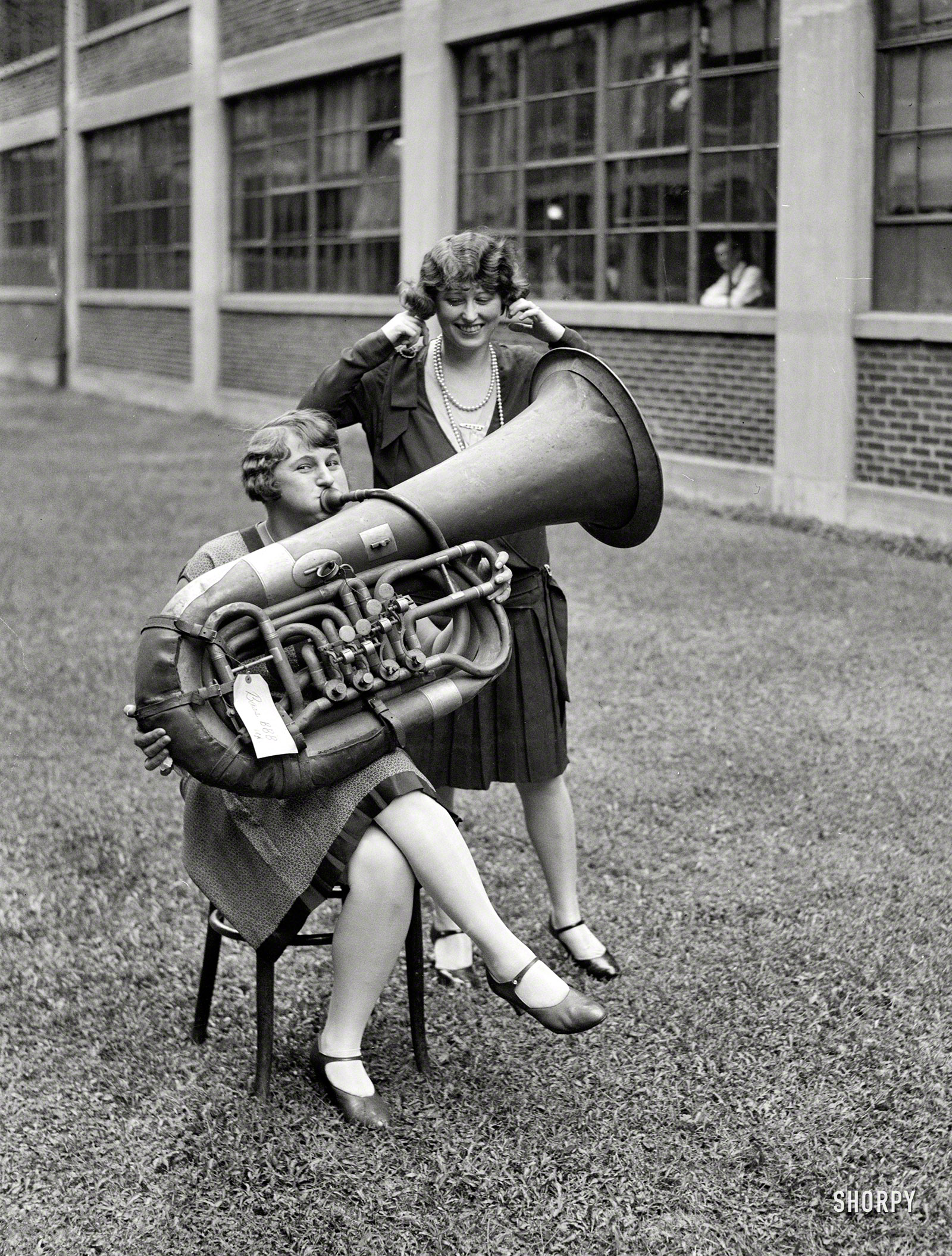 Washington, D.C., 1928. Going out on a low note: "Women with contrabass tuba" is all it says here. Harris & Ewing Collection glass negative. View full size.
