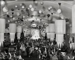 "1932 or 1933. No caption -- dancers in ballroom." The Shorpy Research Department has determined this to be the Washington Arts Club's annual Bal Boheme, specifically the "Castles in the Air" costume ball held Feb. 6, 1933, at the Willard Hotel. Harris &amp; Ewing Collection glass negative. View full size.
Available lightThis photograph is rather grainy, a result of it being shot on emulsion fast enough to capture action in rather low light compared to most of the photos we see here from that time period. 
[The balloon shadows would seem to indicate flash powder was used. - Dave]
The OverlookI do believe I see Jack Torrance there on the floor. What a shining caretaker he was at the time.
(The Gallery, D.C., Harris + Ewing)