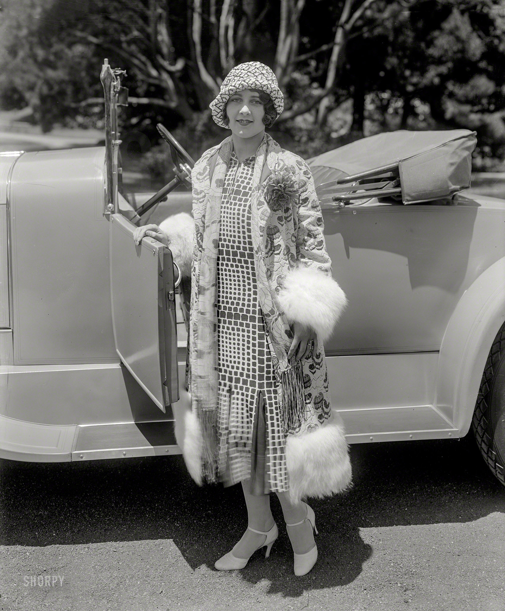 From around 1925 comes this uncaptioned 6x8 glass negative  of Milady and her motorcar somewhere in San Francisco. View full size.