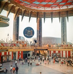 1964. "New York State Pavilion, New York World's Fair." The "Mezzanine Tour" looks just about our speed. Medium-format Ektachrome. View full size.