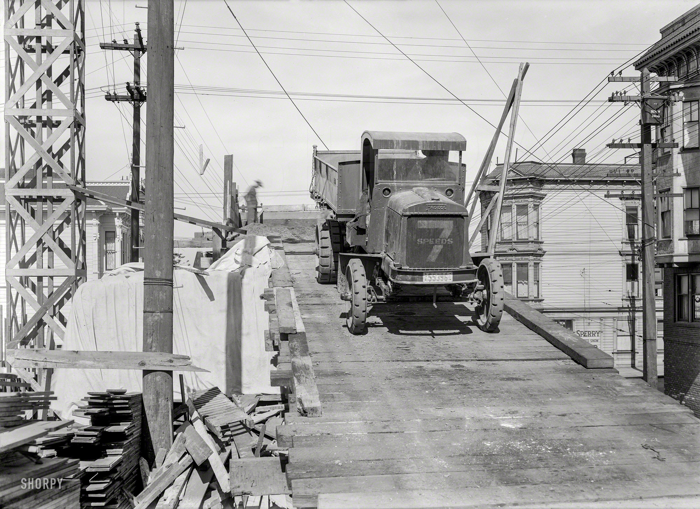 San Francisco, 1922. "Fageol truck on construction ramp." Flintstones-era dumper with solid rubber tires. 5x7 glass negative by Christopher Helin. View full size.