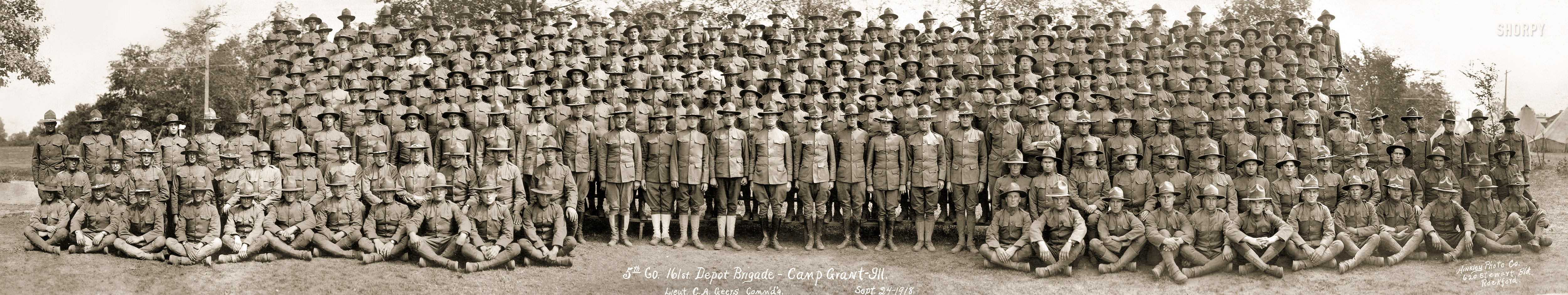 September 24, 1918. "5th Company, 161st Depot Brigade, Camp Grant, Illinois. Lieut. C.A. Geers commanding." Gelatin silver print by Hinkley Photo Co. of Rockford. View full size.