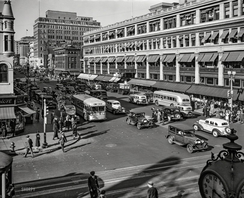 October 1935. Washington, D.C. "Capital Transit buses, F and 13th sts. NW." Just direct your feet to the sunny side of the street. 4x5 glassneg. View full size.
