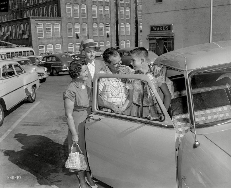 Somewhere in America circa 1954, and it seems to be a big day for Junior. Maybe he just got his driver's license, or his first car, or figured out how to open the door. 4x5 acetate negative, photographer unknown. View full size.
