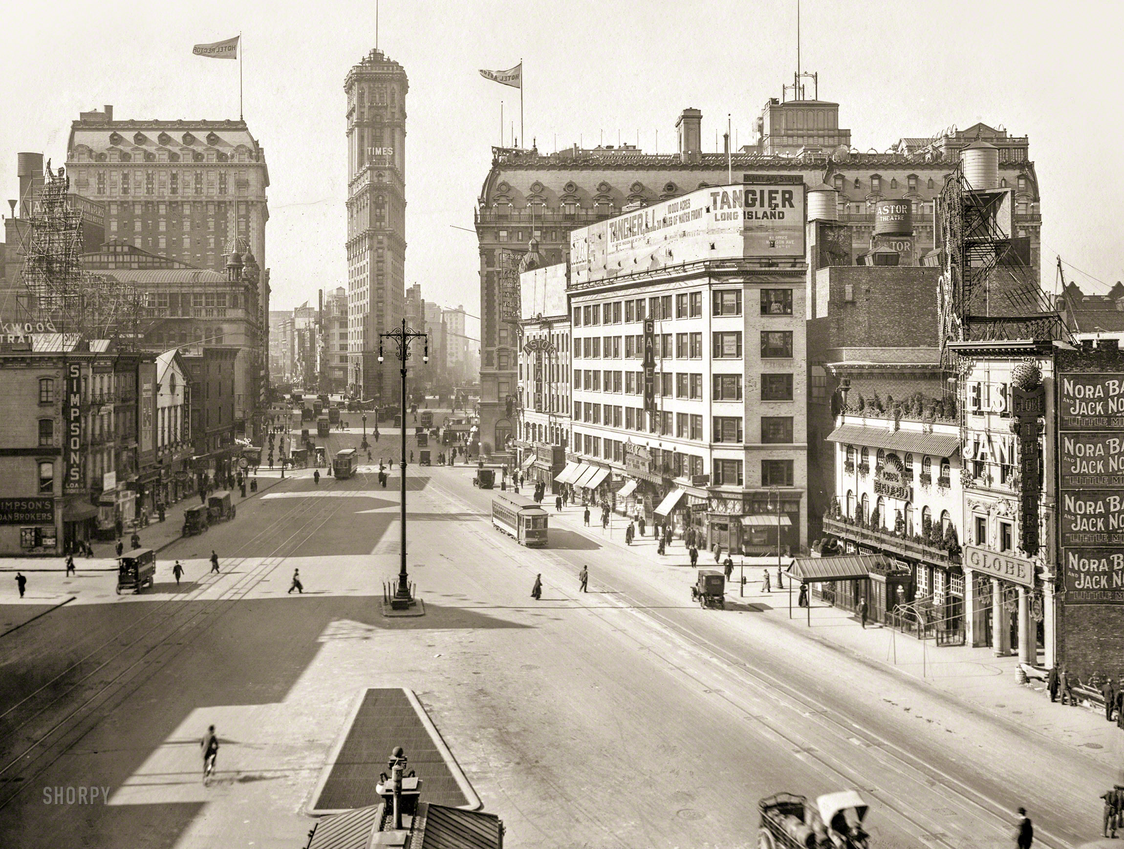 New York, 1911. "Longacre Square south." Times Square to you and me, with the Rector and Astor hotels flanking the New York Times building, now almost completely encased in electronic signage and launch pad for the New Year's "ball drop." Gelatin silver print by Irving Underhill. View full size.
