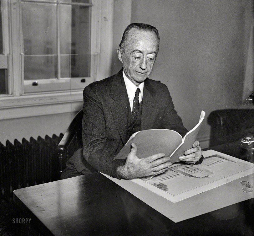 Washington, D.C., circa 1935. "NO CAPTION (man at desk with proposal for Jefferson Memorial)." Harris &amp; Ewing Collection glass negative. View full size.

