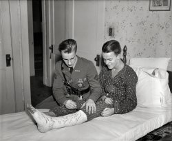 February 11, 1936. Washington, D.C. "NO CAPTION (Young man in bed with leg in cast)." Blown up here. Harris &amp; Ewing glass negative. View full size.
Blown UpClick to embiggen. Note the signature of "Oscar Zilch," which seems to have been a sort of generic joke name of the era.

Nifty uniformI take it the young man in uniform is a cadet at Castle Heights Military Academy ("CHMA"?) Apparently it was a going concern from about 1918 to 1986.
[CHMA stands for Charlotte Hall Military Academy, a school in Maryland. - Dave]
Victory MedalThe young man in uniform is wearing what appears to be a Victory Medal for what we now call the First World War. (In 1936 it was the "Great War," or just, "the War.") But he is clearly too young to have served back then. Perhaps it was his father's. 
Progress, againIt appears to me that a modern Sharpie is much better suited to write on a plaster cast than a fountain pen. 
On the other hand, the docs seem to use those plaster casts less often these days. 
(The Gallery, Harris + Ewing)