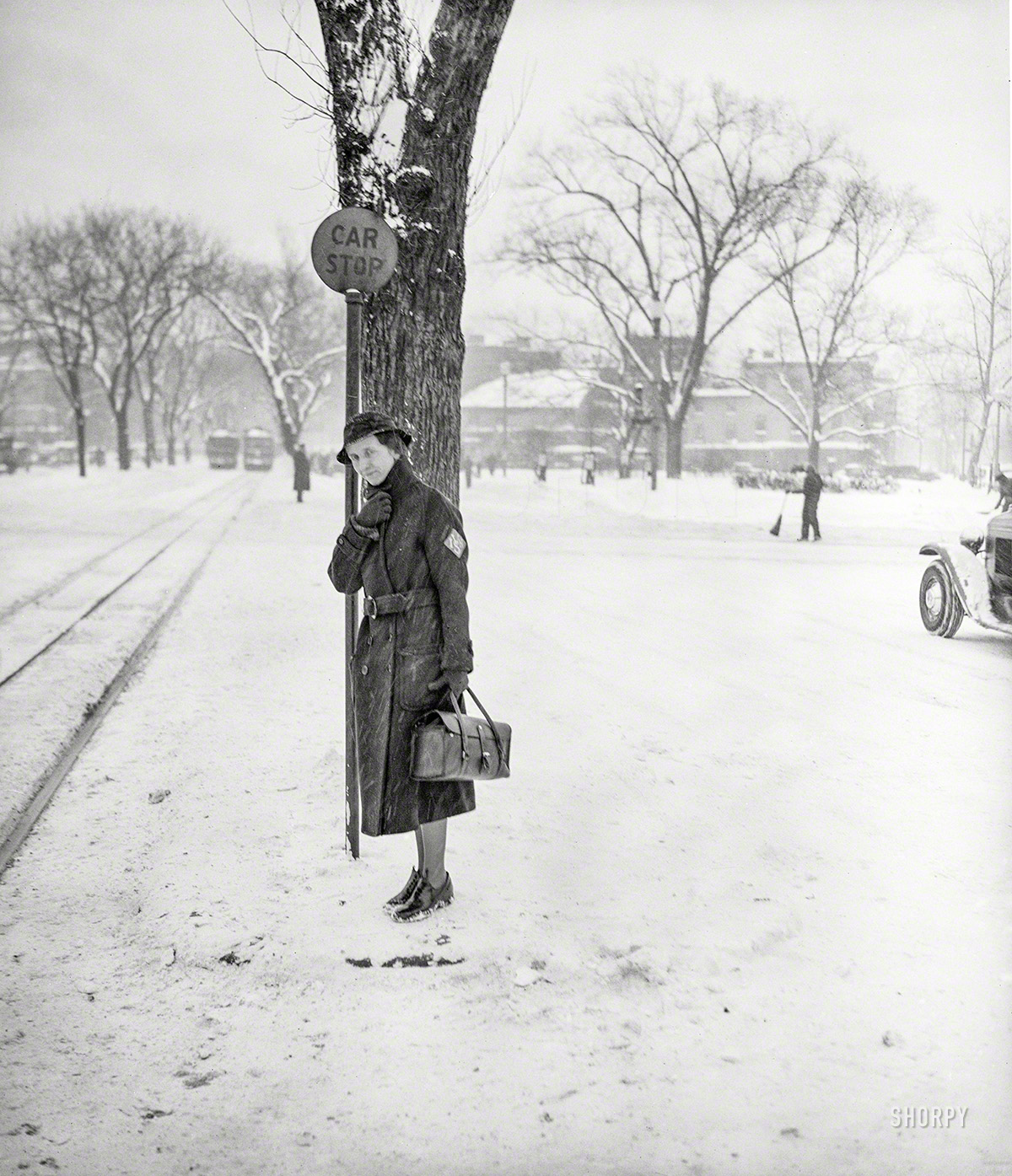 February 1936. Washington, D.C. "Woman in snow." One capital commuter who seems unfazed by the white stuff. Harris & Ewing glass negative. View full size.