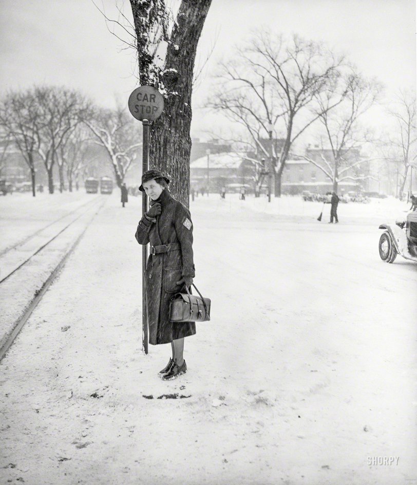 February 1936. Washington, D.C. "Woman in snow." One capital commuter who seems unfazed by the white stuff. Harris &amp; Ewing glass negative. View full size.
