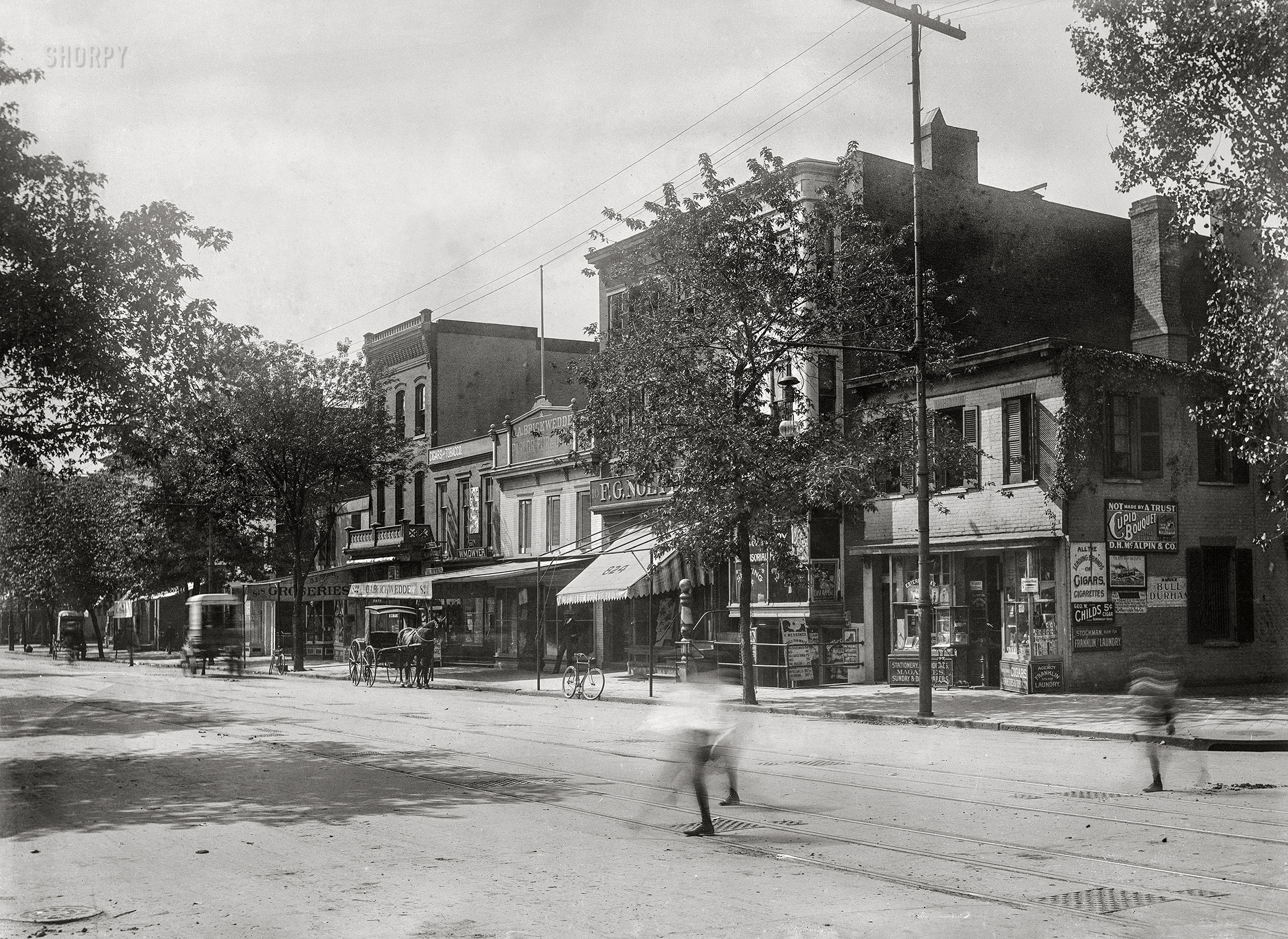 Washington, D.C., circa 1901. "View of Ninth Street N.W., west side, looking south from I Street." 5x7 inch glass negative, D.C. Street Survey Collection. View full size.