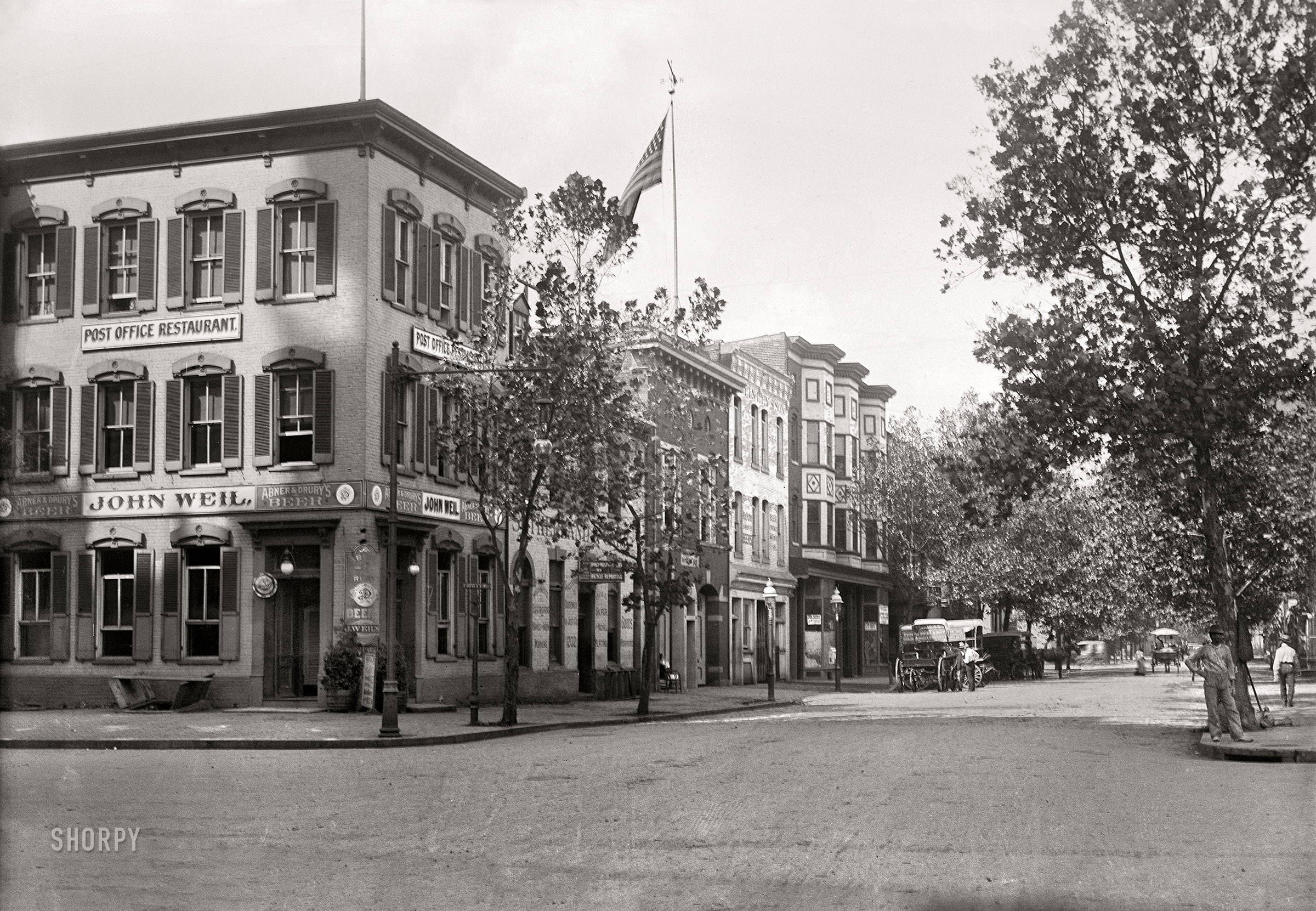 Washington, D.C., circa 1901. "View of D Street N.W., looking west from 12th Street at Pennsylvania Avenue." 5x7 inch glass negative, D.C. Street Survey Collection. View full size.