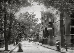 Washington, D.C., circa 1901. "View of unidentified street showing child chasing horse and buggy." The signs affixed to the building at right identify this as (520? 521?) Grant Place. Moldy 5x7 inch glass negative from the D.C. Street Survey Collection.  View full size.