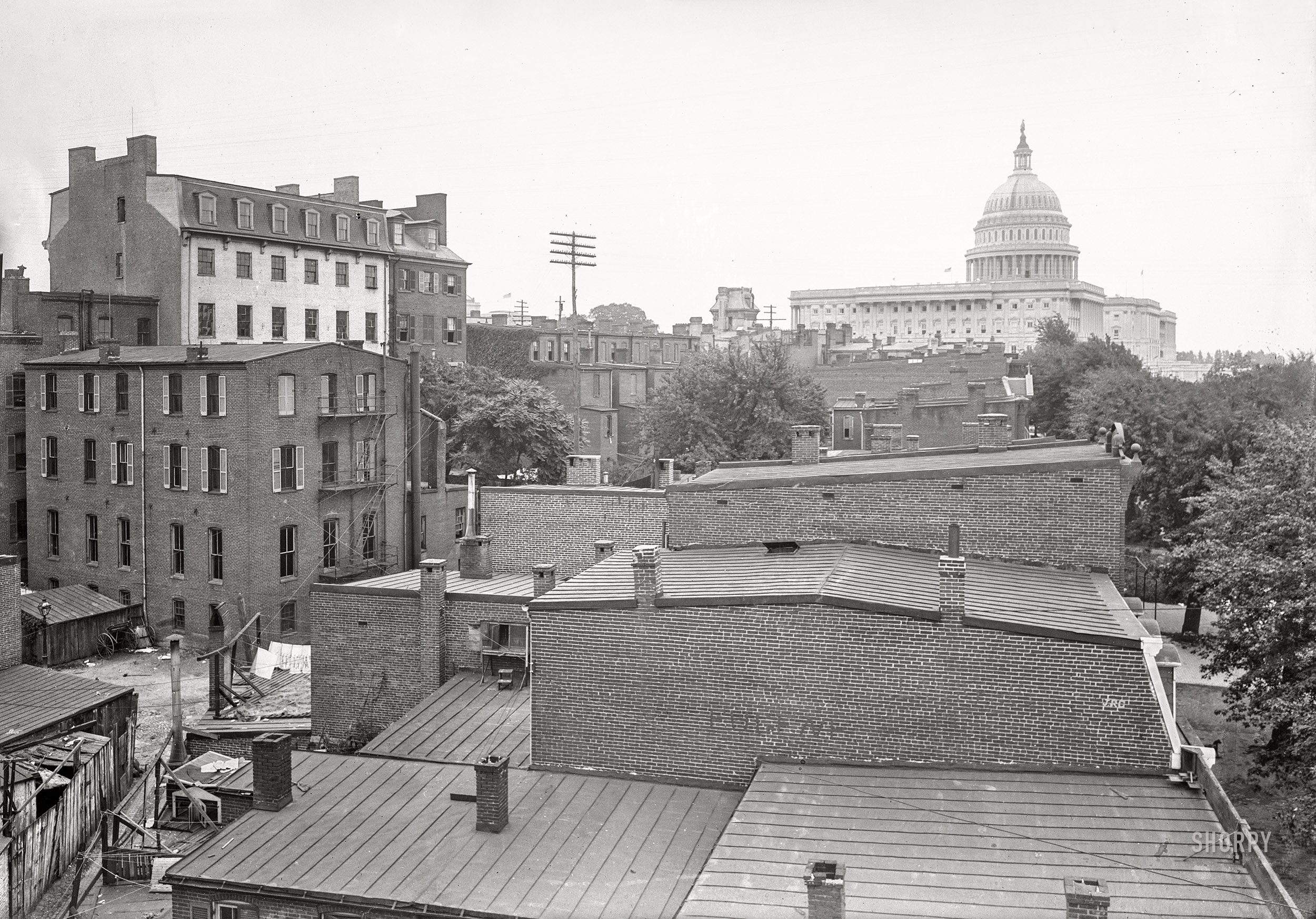 Washington, D.C., 1901. "View of 1st & Delaware N.W., New Jersey Avenue & North Capitol Street N.W., between B & C Streets, probably from Hotel Engel (C & New Jersey), showing rooftops of several buildings and U.S. Capitol in the background. See Z7-23 for fronts of these North Capitol St. bldgs." 5x7 inch glass negative, D.C. Street Survey Collection. View full size.