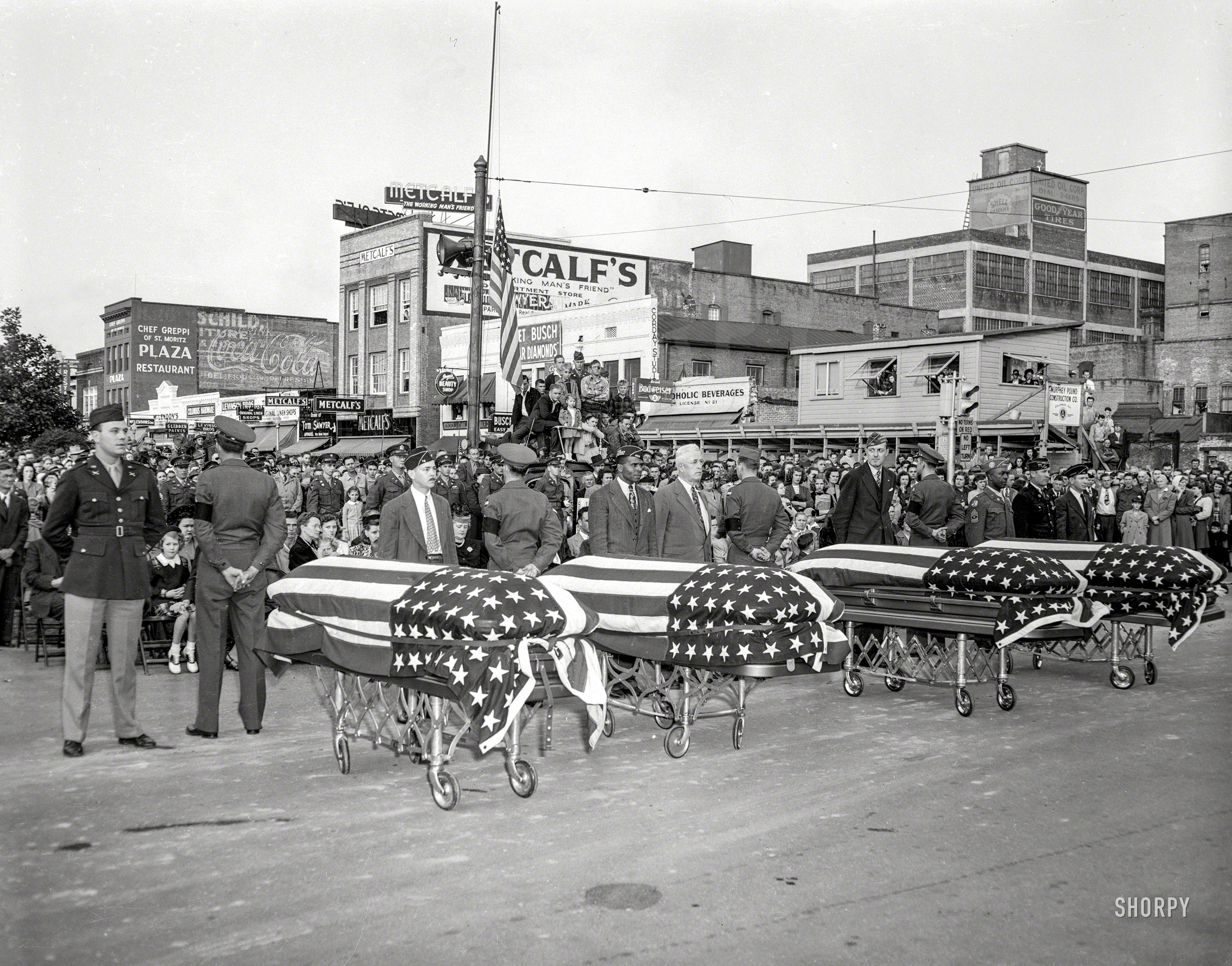 Columbus, Georgia, circa 1951. "Military funeral." One in a series of photos showing a quartet of flag-draped caskets. Georgia historians please fill in the blanks. 4x5 acetate negative, ex newspaper morgue. View full size.