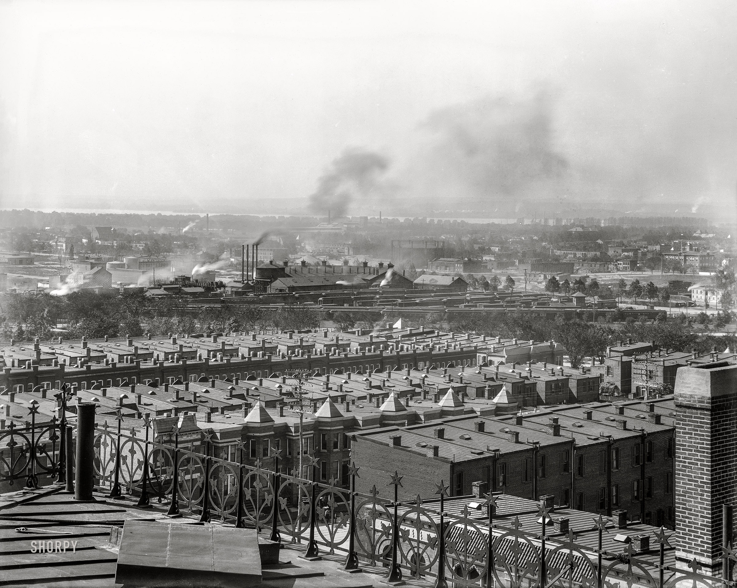 &nbsp; &nbsp; &nbsp; &nbsp; This image is but one section of 10-part panorama, described by the caption below. Some (or even all) of the points of interest mentioned may not be visible here.
Washington, D.C., circa 1901. "Aerial view over rowhouses from old Providence Hospital, showing E Street, Heckman Street [now Duddington Place] and F Street S.E. between 1st and 2nd." 8x10 inch glass negative, D.C. Street Survey Collection. View full size.