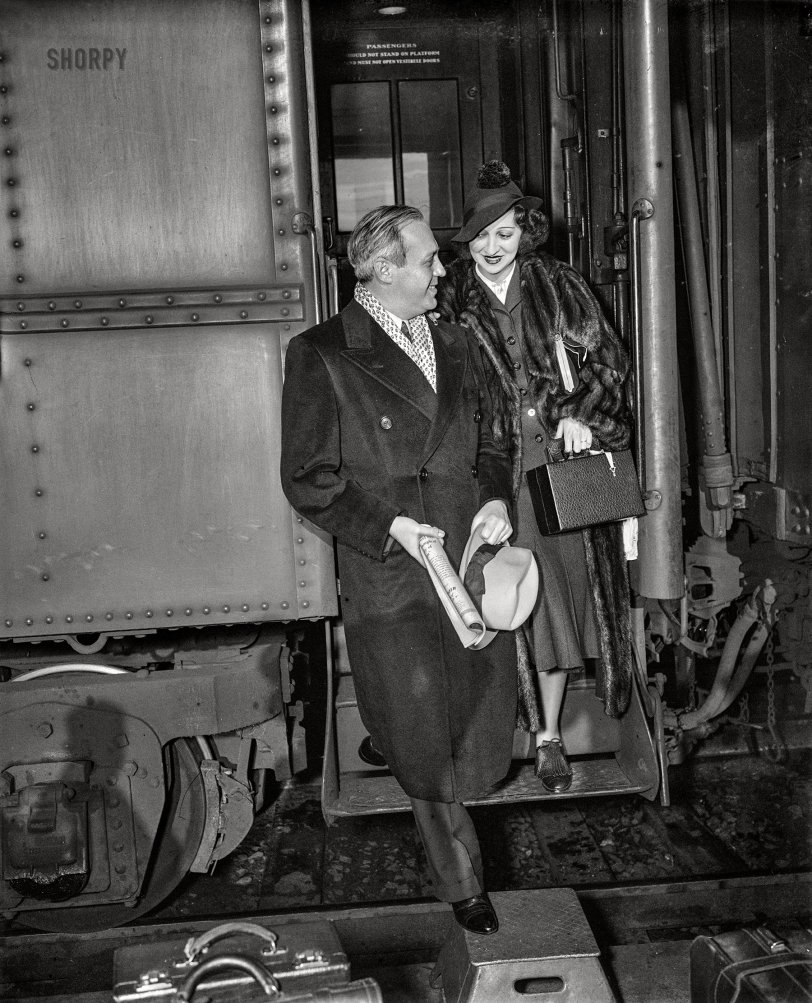 March 13, 1936. Washington, D.C. "Man and woman disembarking from train." 4x5 inch glass negative, Harris &amp; Ewing Collection. View full size. Washington Post, March 14, 1936:


Arriving for Week at Loew's Fox

&nbsp; &nbsp; &nbsp; &nbsp; Arriving in the Capital early yesterday morning, Jack Benny and Mary Livingstone -- Mrs. Benny in private life -- were met and breakfasted by a group of Loew's executives and newspaper representatives. Mr. and Mrs. Benny are here for a week of personal appearances, in conjunction with an elaborate stage revue, at Loew's Fox Theater. Mr. Benny's Sunday night broadcast will be made from the auditorium of the National Press Club ...

