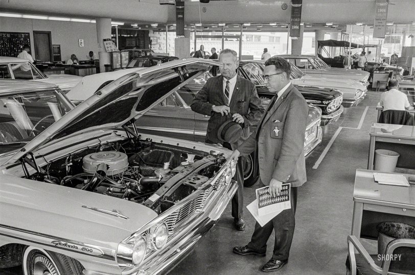 June 23, 1964. "Ford showroom in Wheaton, Maryland." 35mm negative by Warren K. Leffler for U.S. News &amp; World Report. View full size.
