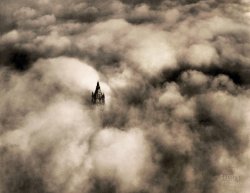 May 22, 1928. "Woolworth tower in clouds, New York City." Photo by Fairchild Aerial Surveys Inc. View full size.