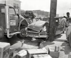 Circa 1958. Plymouth meets peaches in the first of a series of car crash photos taken in and around Oakland, California. 4x5 Kodak Safety Film. View full size.