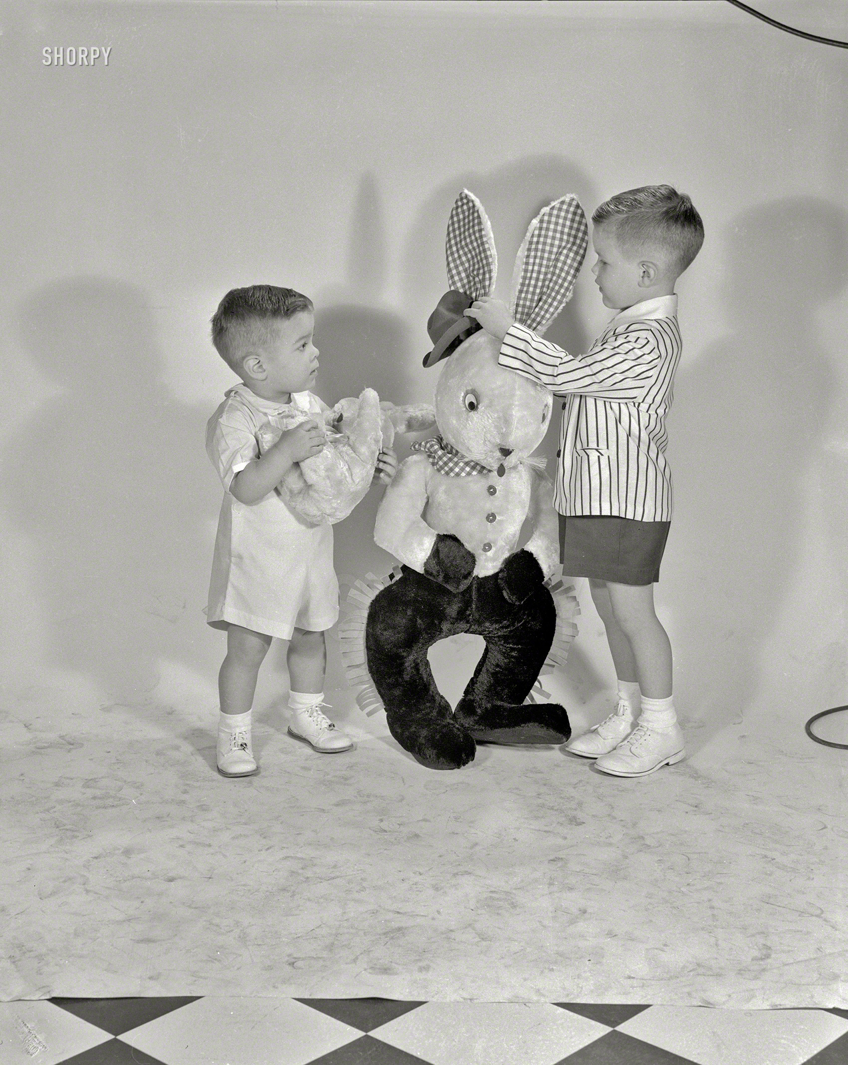 Columbus, Georgia, circa 1957. "Boys with Cowboy Easter Bunny." 4x5 acetate negative from the Shorpy News Photo Archive. View full size.