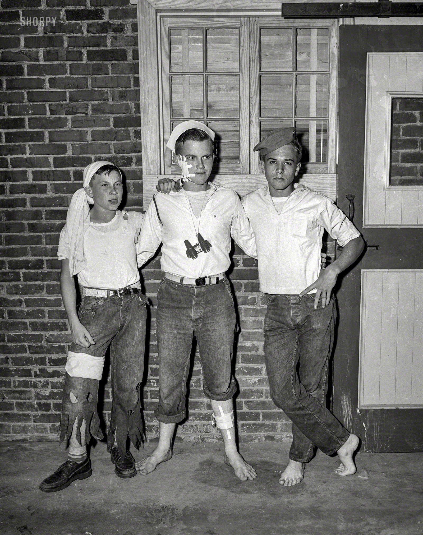 Columbus, Georgia, circa 1948. "Philip Schley" and "Musketeers" is all it says here. Hide your women and lock up the silver! 4x5 acetate negative. View full size.
