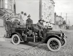 San Francisco, 1921. "Sonora Fire Dept. (Tuolumne County) REO truck at Engine Company No. 15 firehouse, California Street." 6½ x 8½ inch glass negative, originally from the Wyland Stanley collection. View full size.