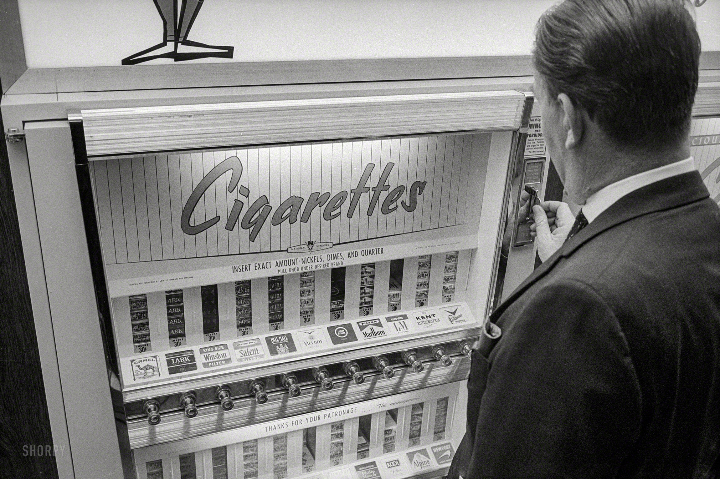 April 20, 1965. "Vending Machines, Cigarettes." 35mm negative by Marion S. Trikosko for U.S. News & World Report. View full size.