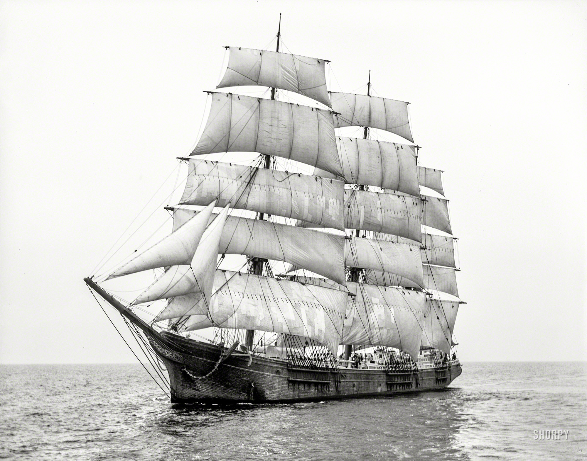 &nbsp; &nbsp; &nbsp; &nbsp; Said to have been the last full-rigged ship built in Massachusetts, the Mary L. Cushing was launched in Newburyport in 1883 by George E. Currier. Registered to Pendleton, Carver & Nichols of Searsport in 1895, and eventually sold into the salmon trade; disappeared from the register in 1907.
— Penobscot Marine Museum
Off Sandy Hook Light circa 1899. "Sailing ship Mary L. Cushing." 8x10 inch dry plate glass negative, Detroit Photographic Company. View full size.