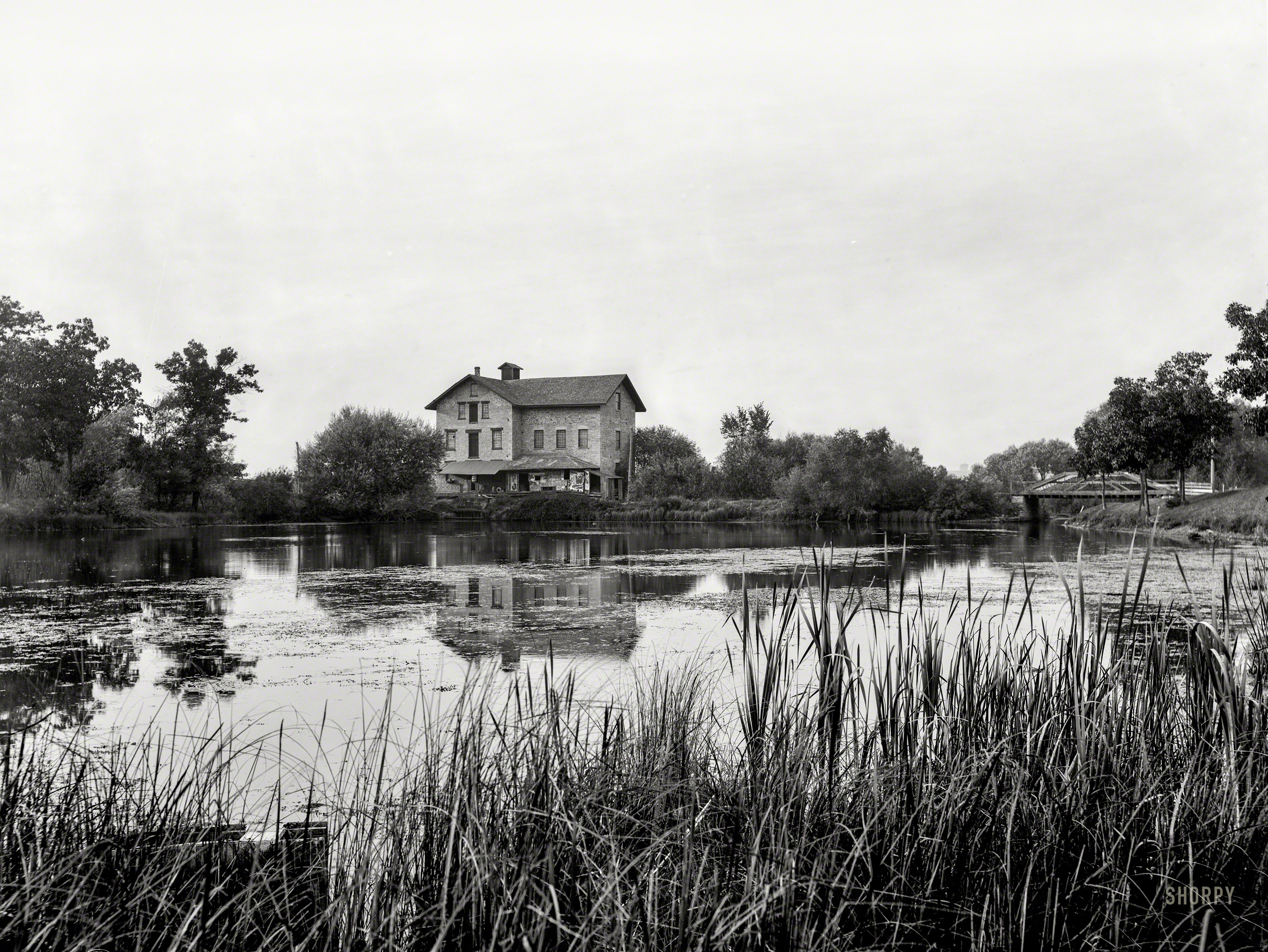 Green Lake, Wisconsin, circa 1899. "Old mill at railway station." 8x10 inch dry plate glass negative, Detroit Publishing Company. View full size.