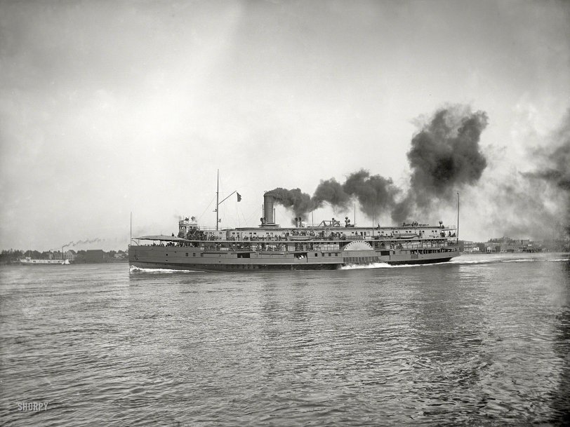 Circa 1899. "Sidewheeler City of Alpena." 8x10 inch dry plate glass negative, Detroit Publishing Company. View full size.

&nbsp; &nbsp; &nbsp; &nbsp; The CITY OF ALPENA, launched from the Detroit Dry Dock Co. in Wyandotte in 1893, was one of several elegant paddlewheel steamboats operated by the Detroit & Cleveland Line out of Detroit. The line dated to 1849 and eventually included 10 large vessels, serving ports all over Lake Erie and Lake Huron.

&nbsp; &nbsp; &nbsp; &nbsp; The impressive CITY OF ALPENA and sister ship CITY OF MACKINAC were 285 feet long and driven by 2,000-horsepower steam engines. They carried as many as 400 passengers along with significant cargoes of package freight, merchandise and foodstuffs. They provided a critical link to big cities like Toledo, Detroit and Saginaw in the years before completion of railroads and highways to the communities of booming Northeast Michigan.

&nbsp; &nbsp; &nbsp; &nbsp; The CITY OF ALPENA was taken off the "Coast Line to Mackinac" in 1921 when the lumbering industry had moved to the West Coast and railroads connected most of the towns in the region. She operated afterward on Lake Michigan as the CITY OF SAUGATUCK, and ended up in the late 1930s as a barge, carrying pulpwood and later petroleum products. The once-proud ship was broken up for scrap in 1957.
-- C. Patrick Labadie, Historian
Thunder Bay National Marine Sanctuary
