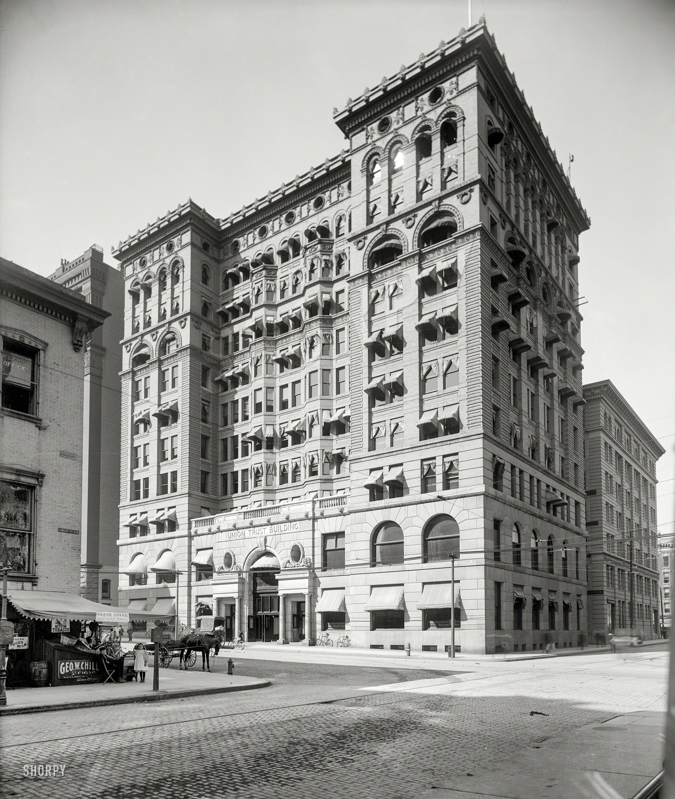 1900. "Union Trust Building, Detroit." Romanesque Revival wedding cake at Griswold and Congress that went up in 1896, came down in 1956. View full size.