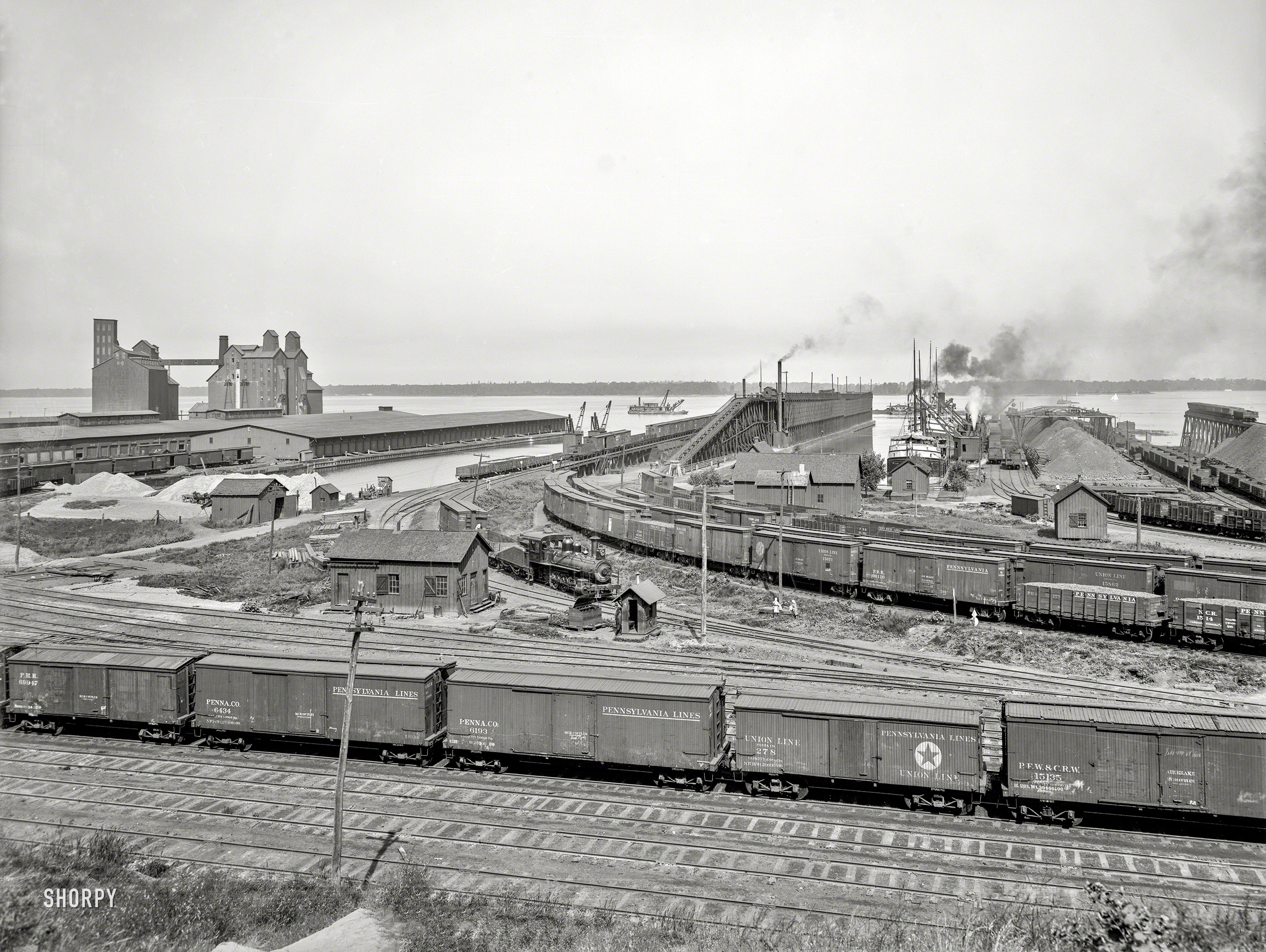 Circa 1900. "Anchor Line docks and Penna. R.R. coal & ore docks, Erie, Pennsylvania." Also represented: Cars of the Pittsburgh, Fort Wayne & Chicago Railway. 8x10 inch glass negative, Detroit Publishing Co. View full size.