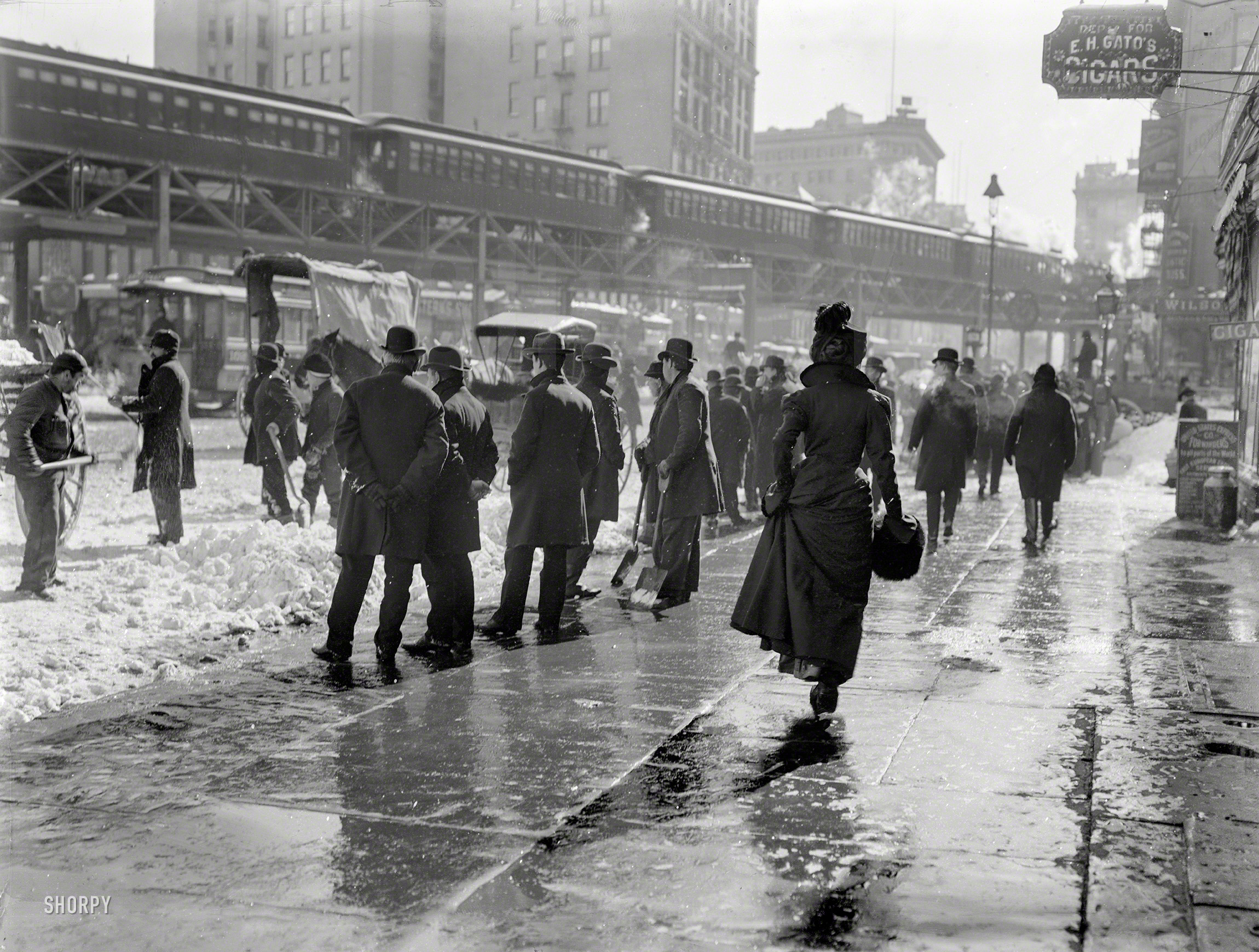 1899. "Blizzard '99 -- On the streets after a New York blizzard." 8x10 glass negative by Byron. Detroit Publishing Company. View full size.
