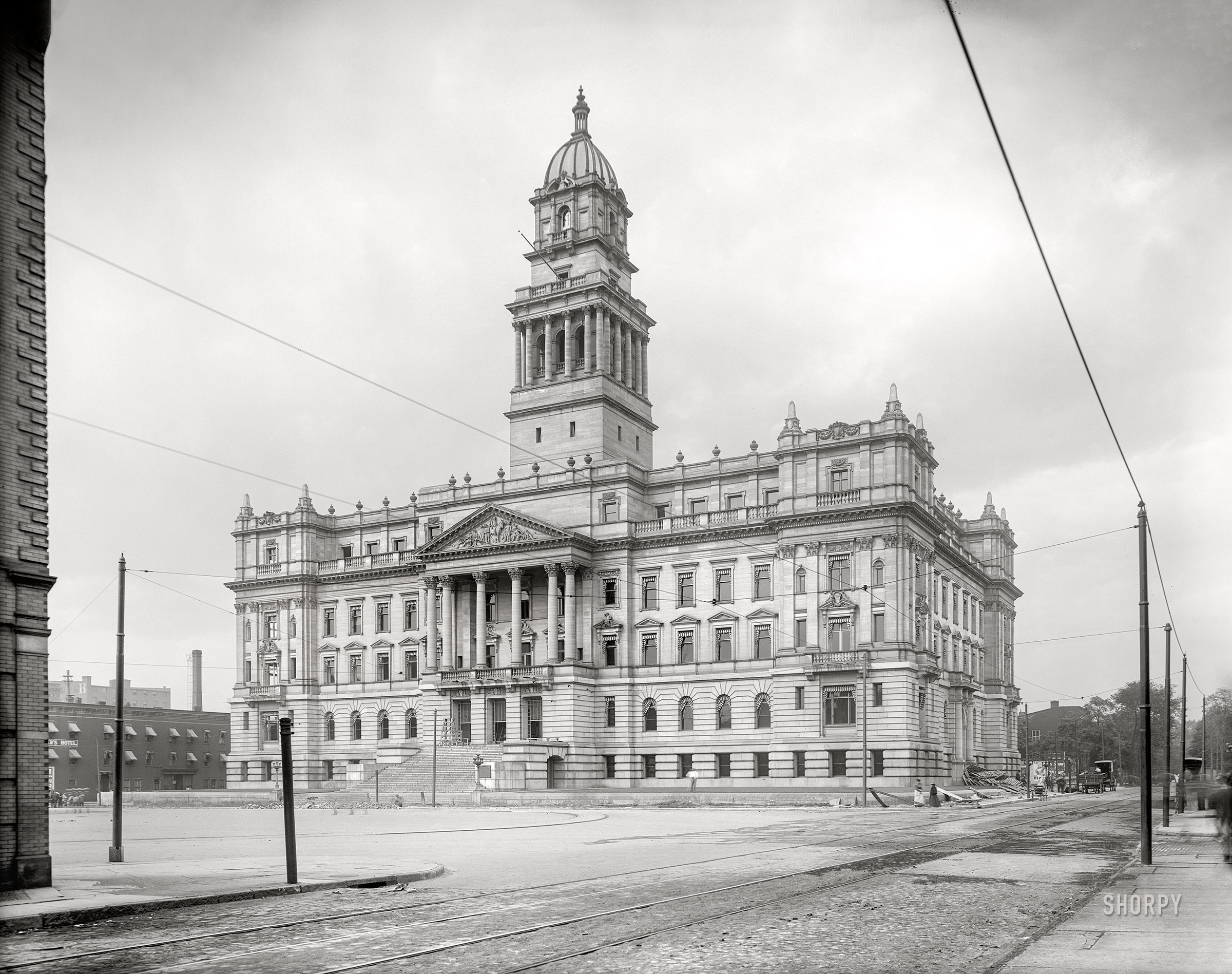 Detroit, Michigan, circa 1901. "Wayne County Building." This multi-layered municipal confection, completed in 1902, still stands as a monument to the wedding-cake school of architecture. 8x10 inch glass negative, Detroit Photographic Co. View full size.