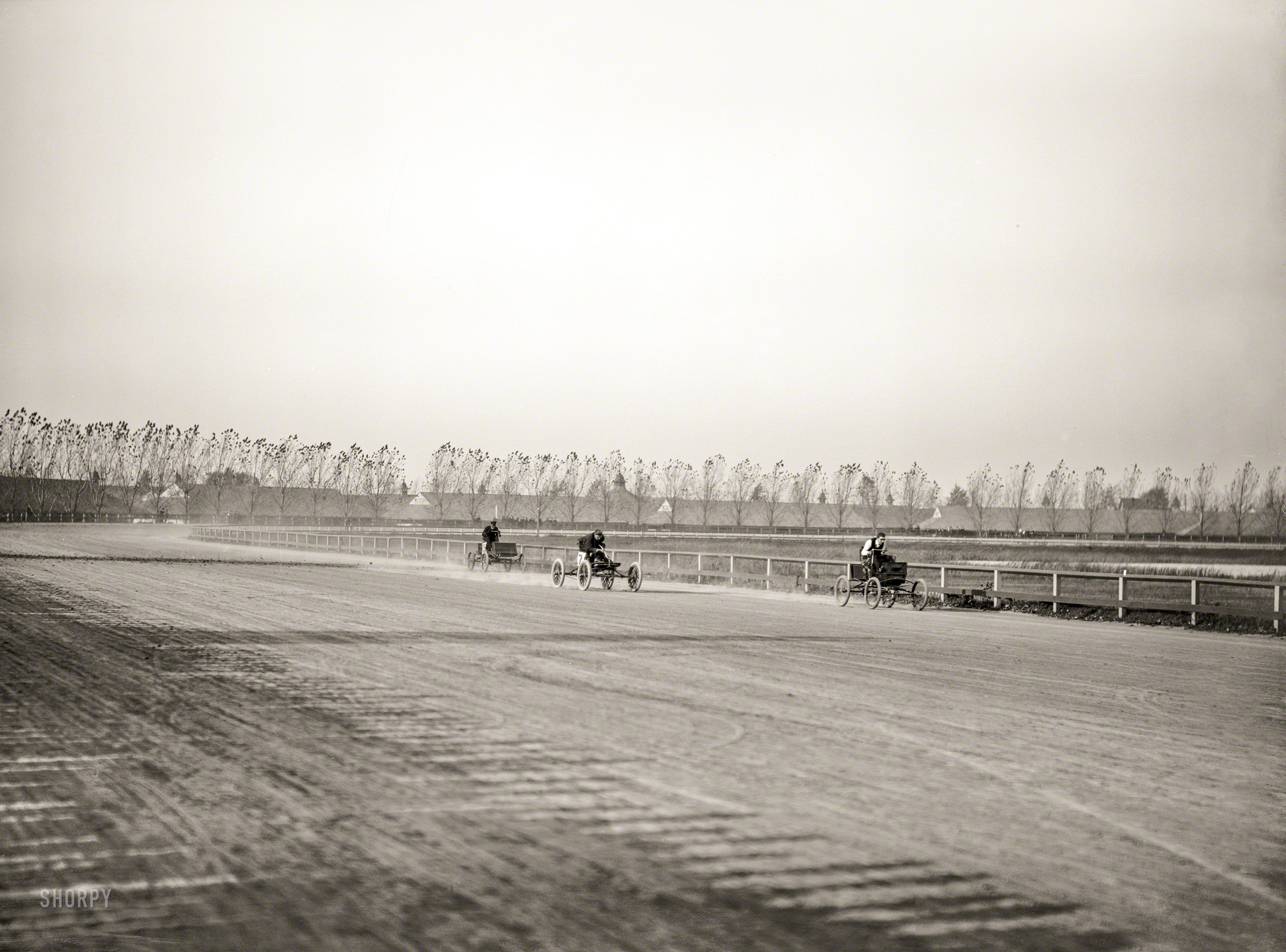 1902. "Reimers Loco winning five-miles event in 10:51 4-5, Grosse Pointe track, Detroit." A Locomobile steamer piloted by one M.R. Reimers. View full size.